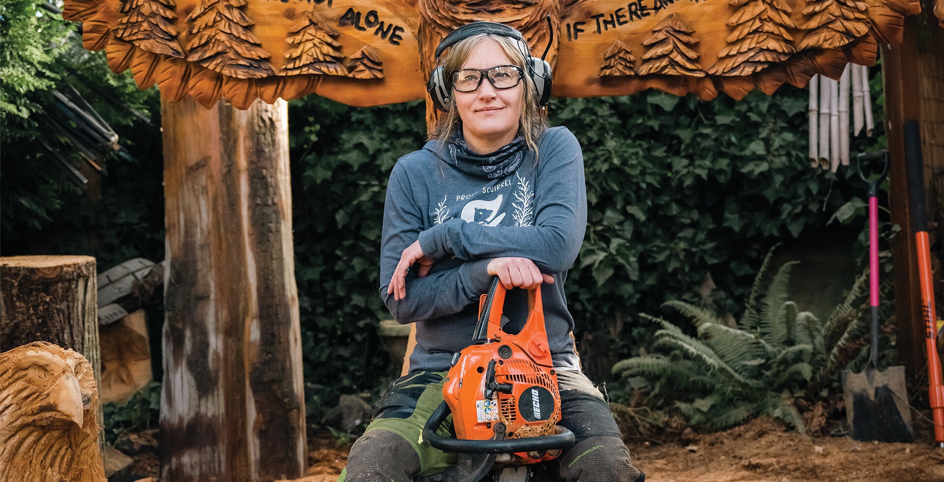 In her Bellingham backyard Leigh Woody creates chainsaw art centered around outdoor themes.